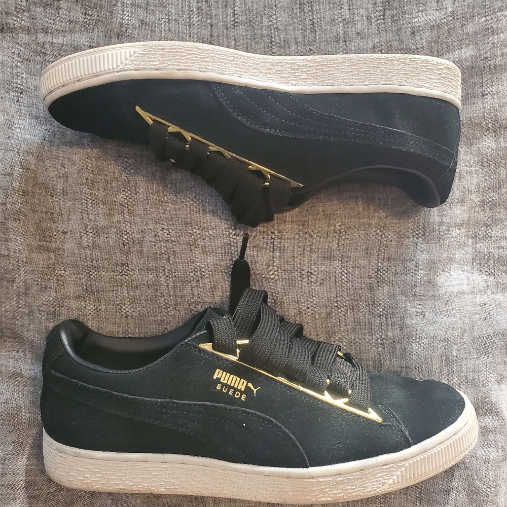 Black and Gold Suede Pumas
